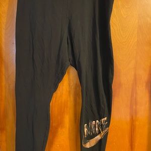 Full length black Nike workout legging.